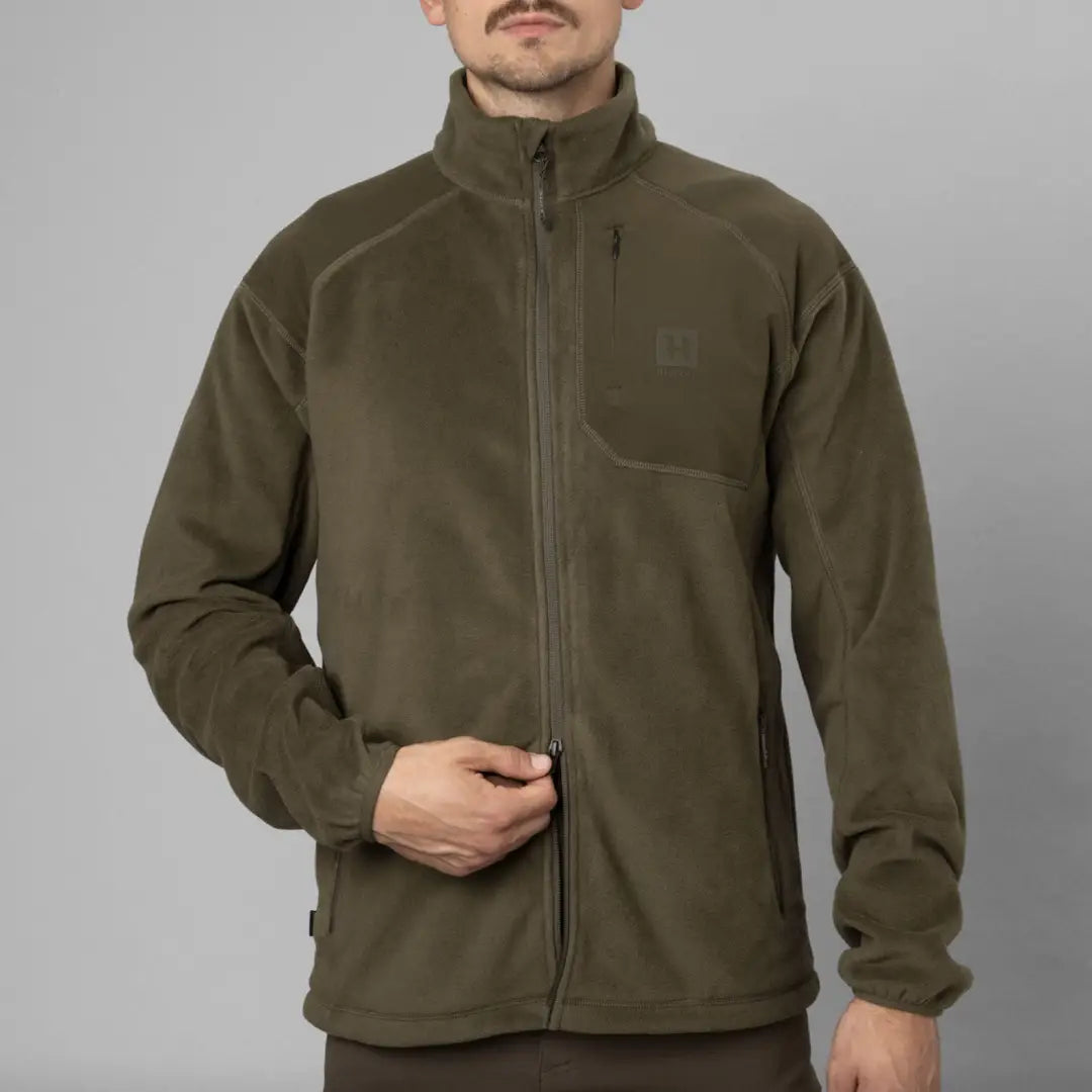 Olive green Harkila Venjan fleece jacket with high collar and full-length zipper