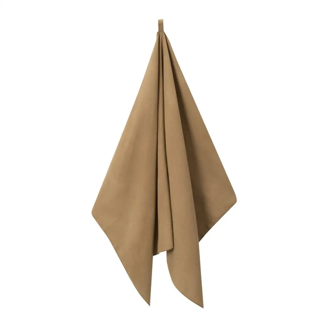 Beige cloth napkin folded like a triangle, perfect for Helikon-Tex Field Towel uses