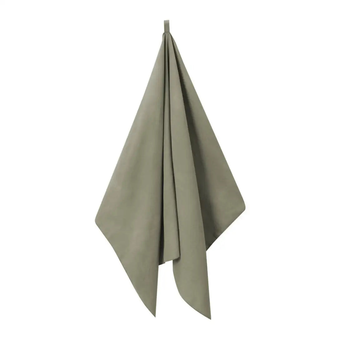 Sage green Helikon-Tex Field Towel in a stylish triangular fold for country clothing