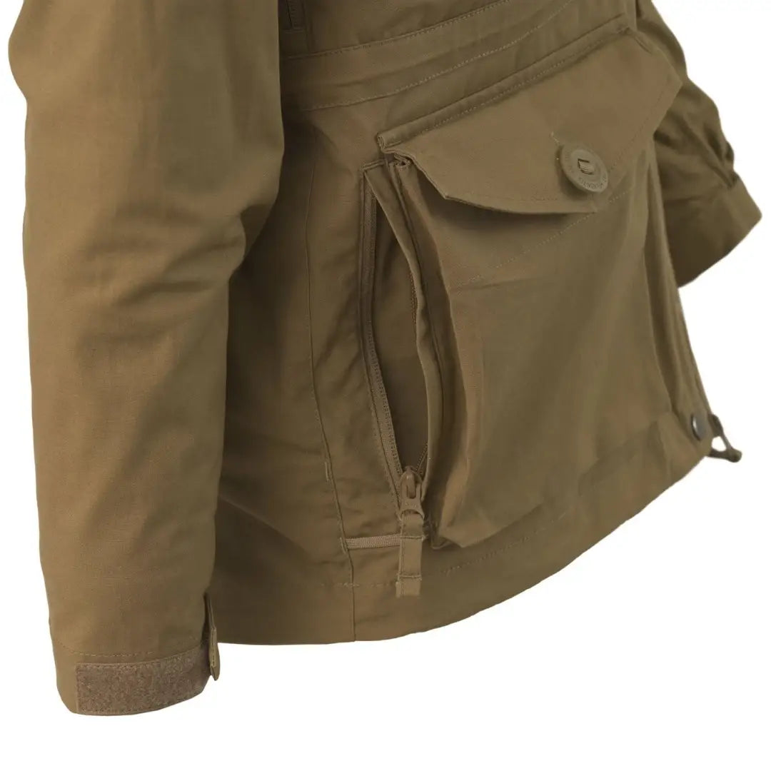 Olive green SAS smock jacket featuring pockets and button closures for style and utility