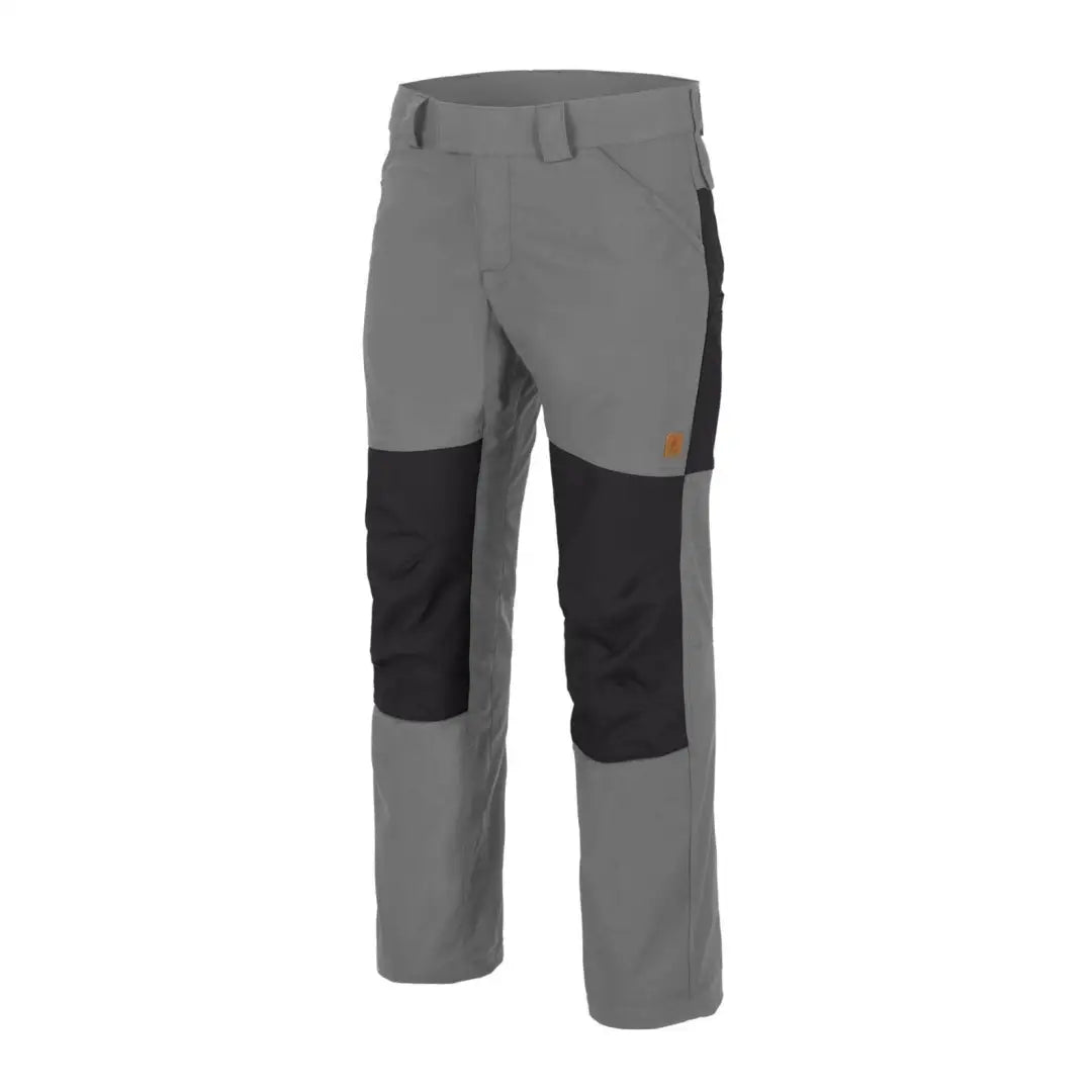 Gray Helikon-Tex Woodsman Pants with black knee patches for outdoor enthusiasts