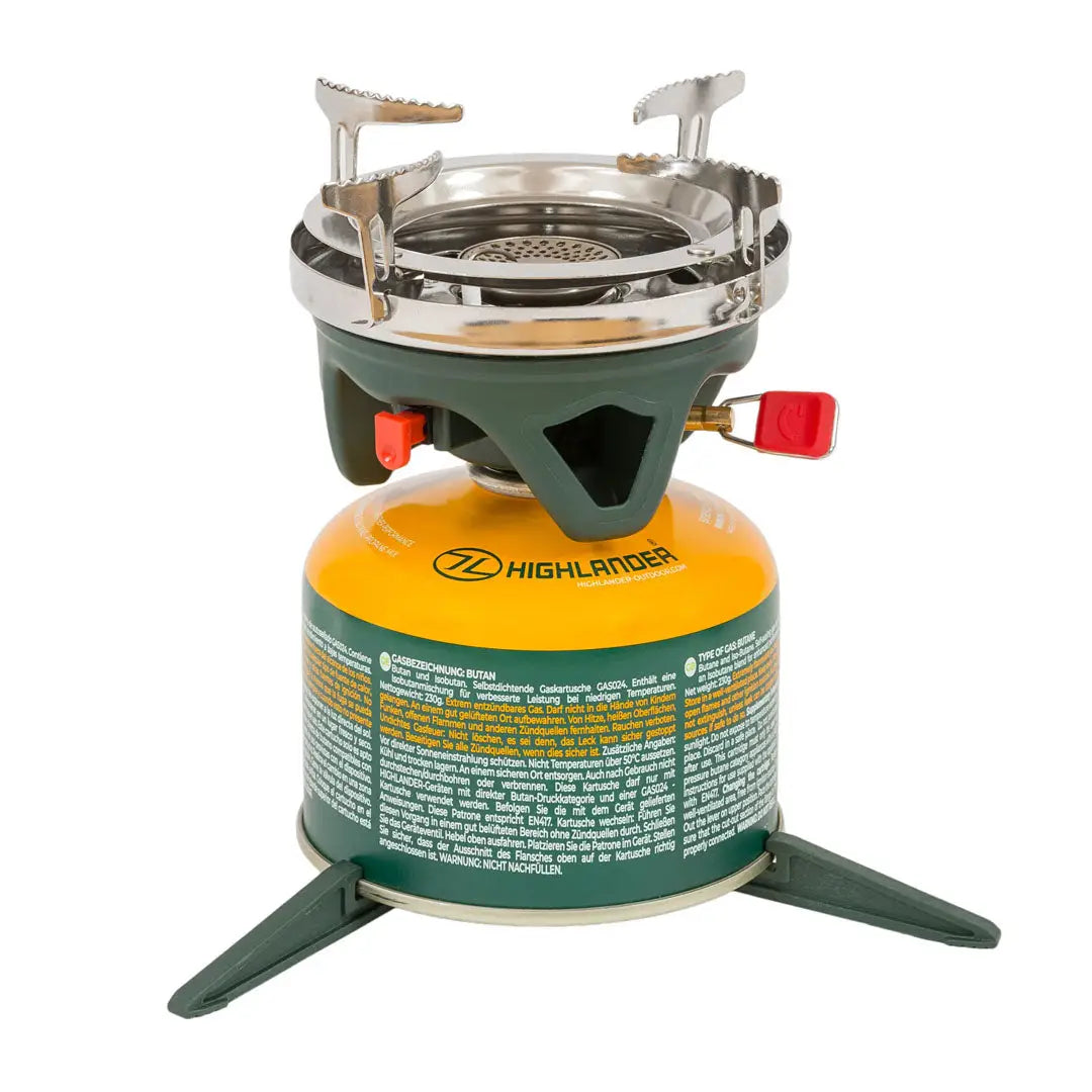 Portable Highlander Fastboil 3 Gas Stove with a green base and yellow gas cartridge