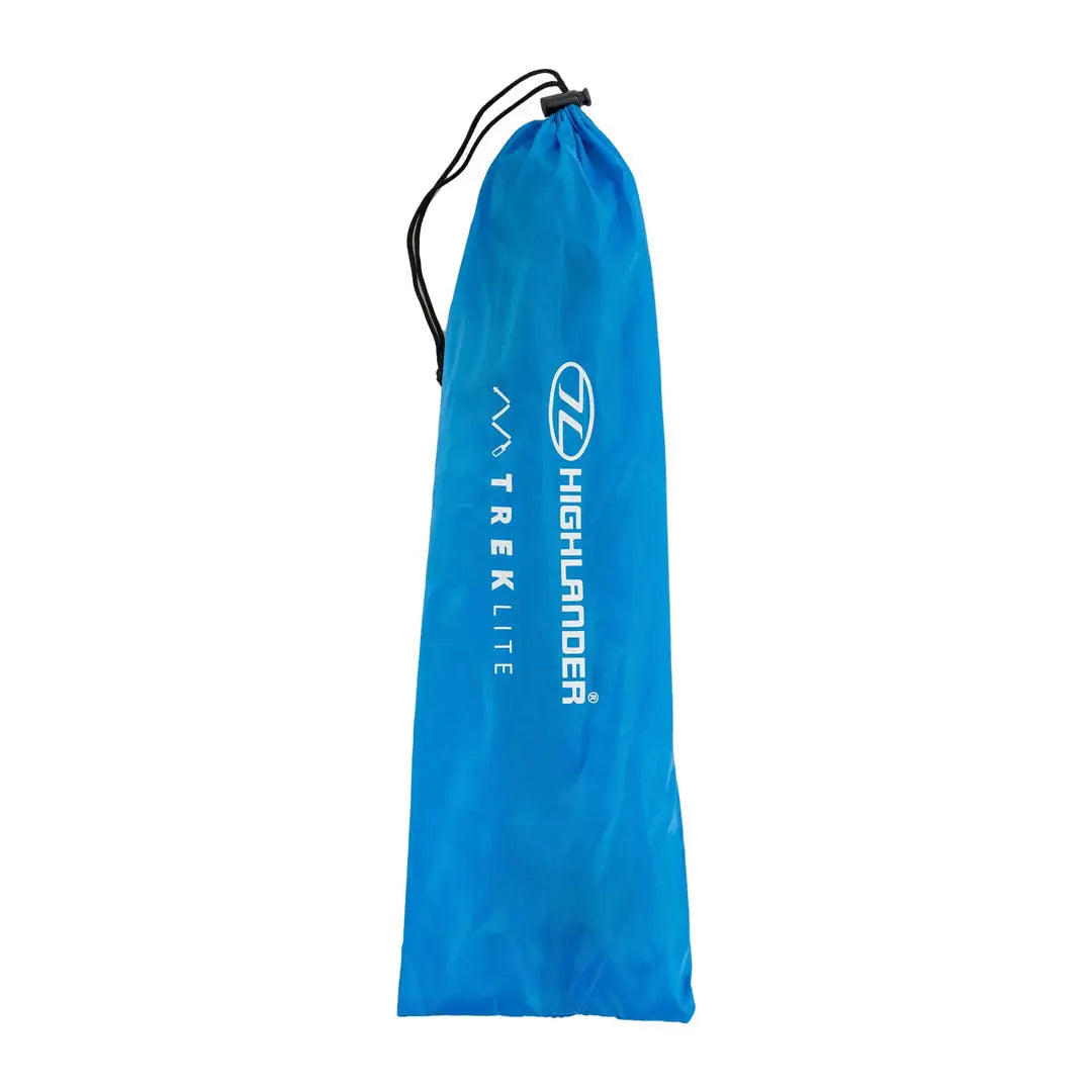 Blue drawstring bag with Highlander Trek Lite branding next to a walking pole