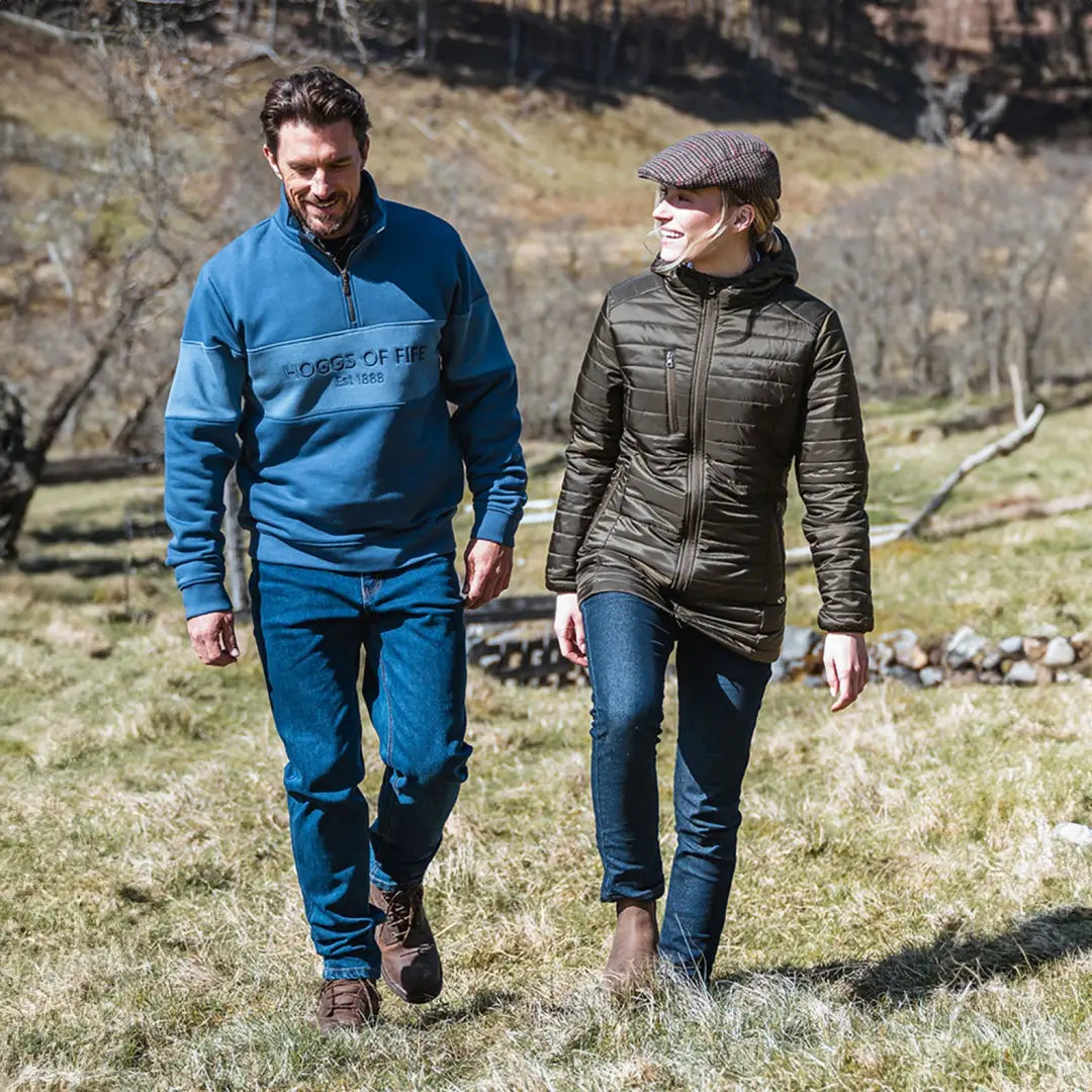 Two people in casual hiking gear wearing Kingston Ladies Hooded Jacket outdoors