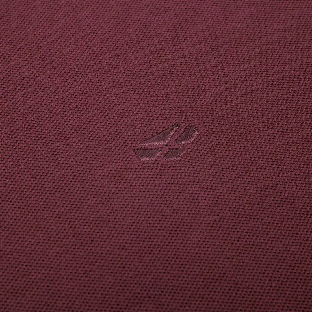 Burgundy fabric with embossed logo on Hoggs Of Fife Largs Polo Shirt