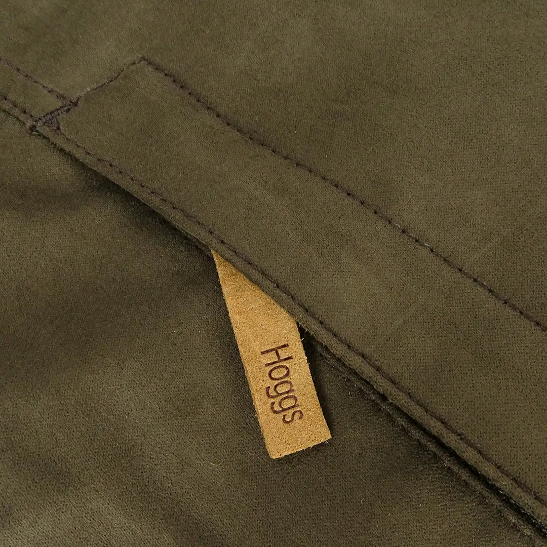 Olive green fabric with Hoggs tag on a stylish ladies hunting jacket