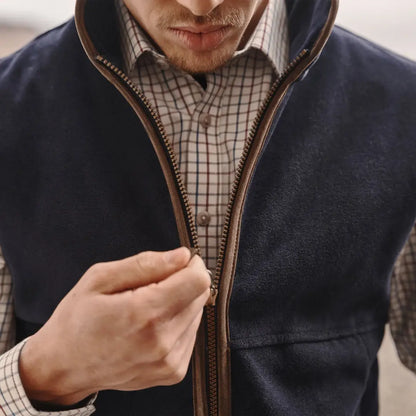 Navy blue zip-up vest over a checkered shirt from Hoggs of Fife Stenton Technical Fleece