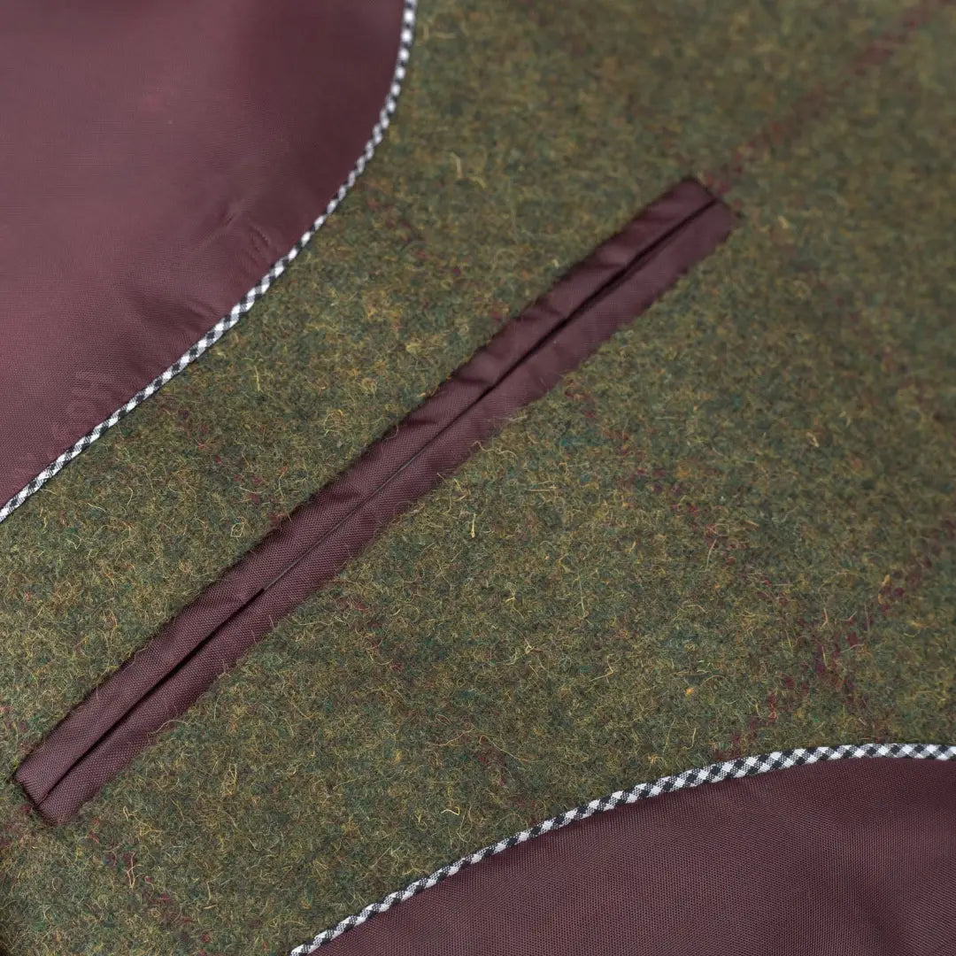 Wooden plank on green fabric next to Hoggs Of Fife Tummel Tweed Sports Jacket