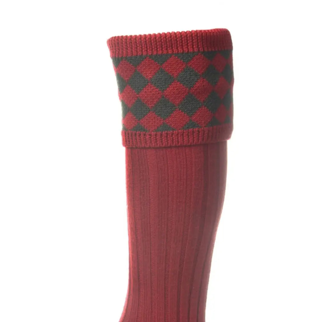 Red and green patterned House of Cheviot Chessboard Socks in merino wool blend