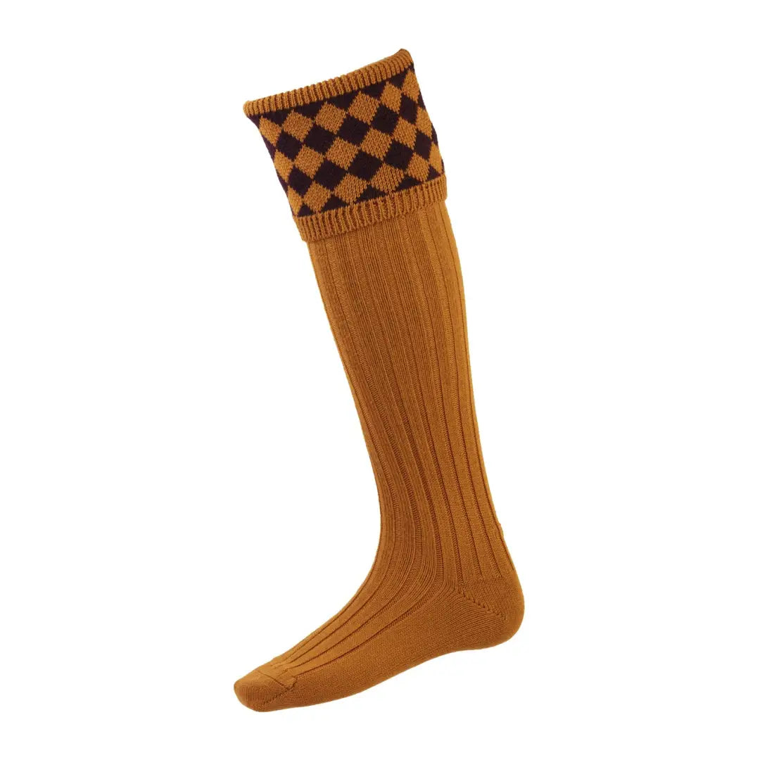 Knee-high mustard yellow Cheviot Chessboard Socks with a stylish checkered top