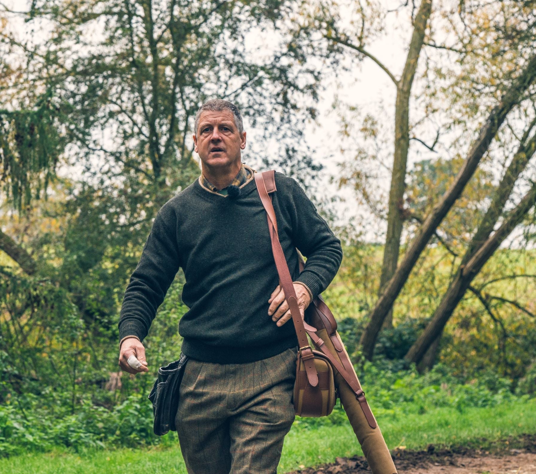 Man wearing hunting gear with Jack Pyke Ashcombe V-Neck Jumper