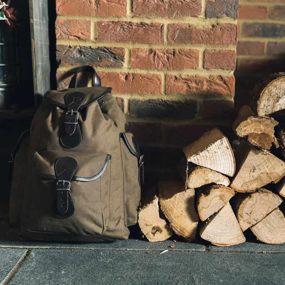 Stylish Jack Pyke Canvas Day Pack featuring leather straps and buckles