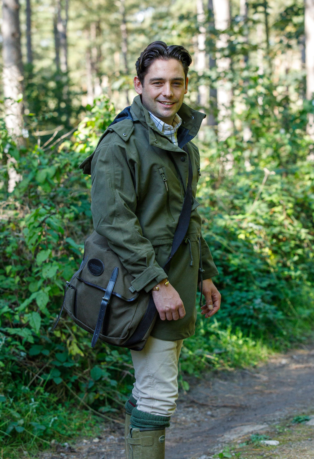 Green hooded jacket and shoulder bag from Jack Pyke Canvas Dog collection