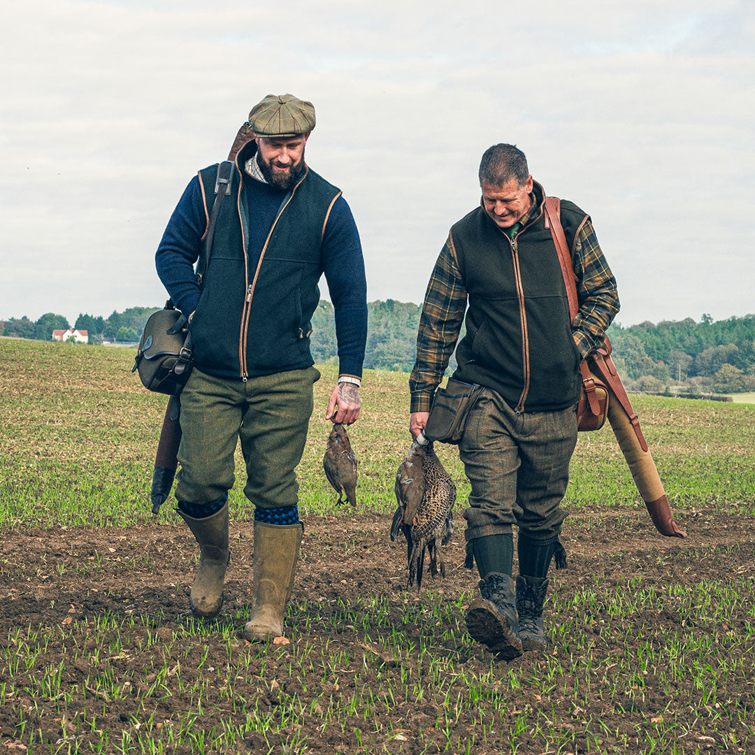 Two hunters proudly wearing Jack Pyke 300gsm micro fleece Gilet with game birds