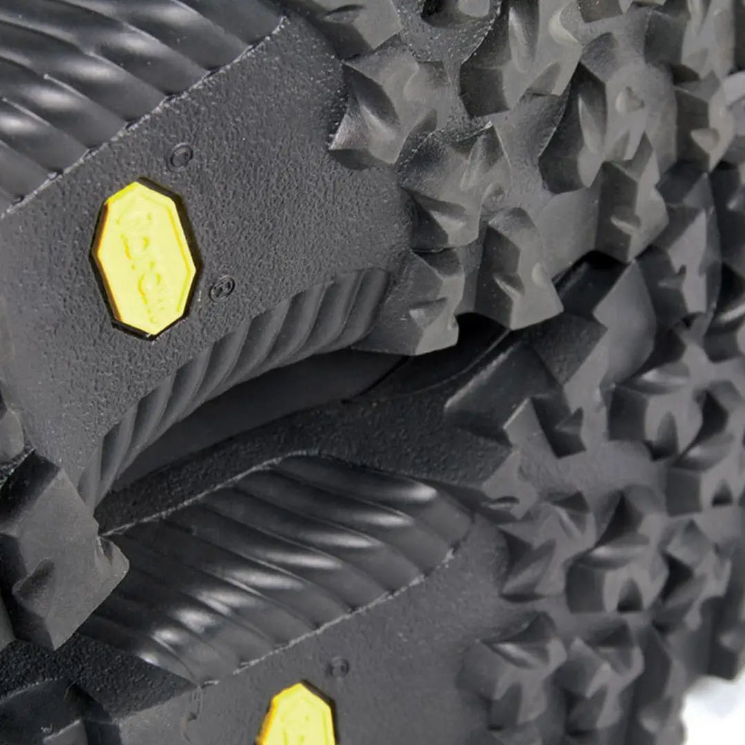 Textured rubber sole of Jack Pyke Hunters Boots with stylish yellow accents