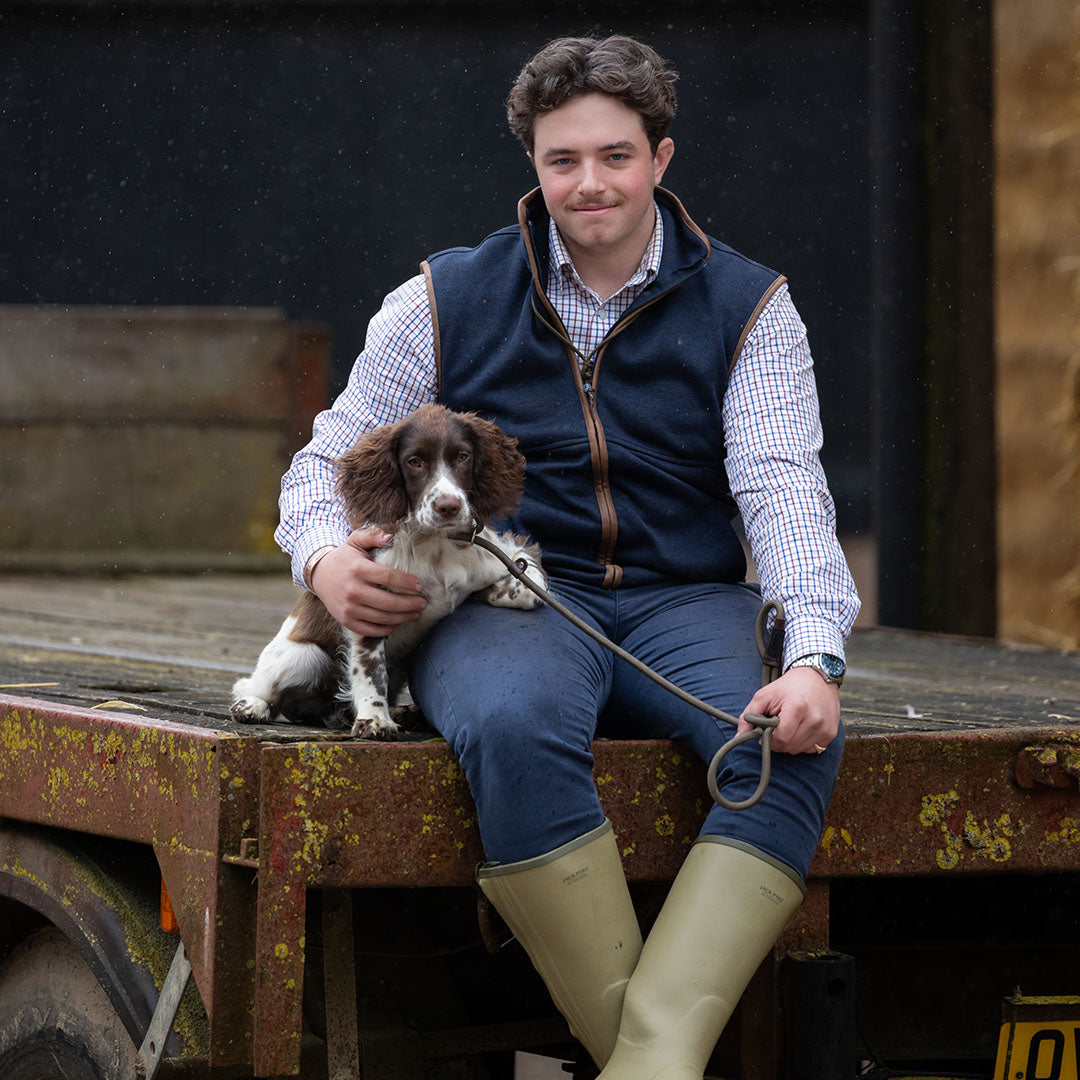 Man and dog enjoying the outdoors in a Jack Pyke Melange Fleece Gilet Navy