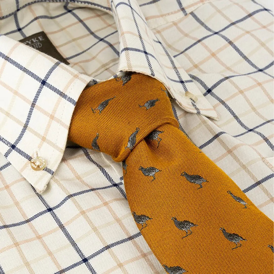 Mustard yellow Jack Pyke Partridge silk tie with cute blue bird pattern