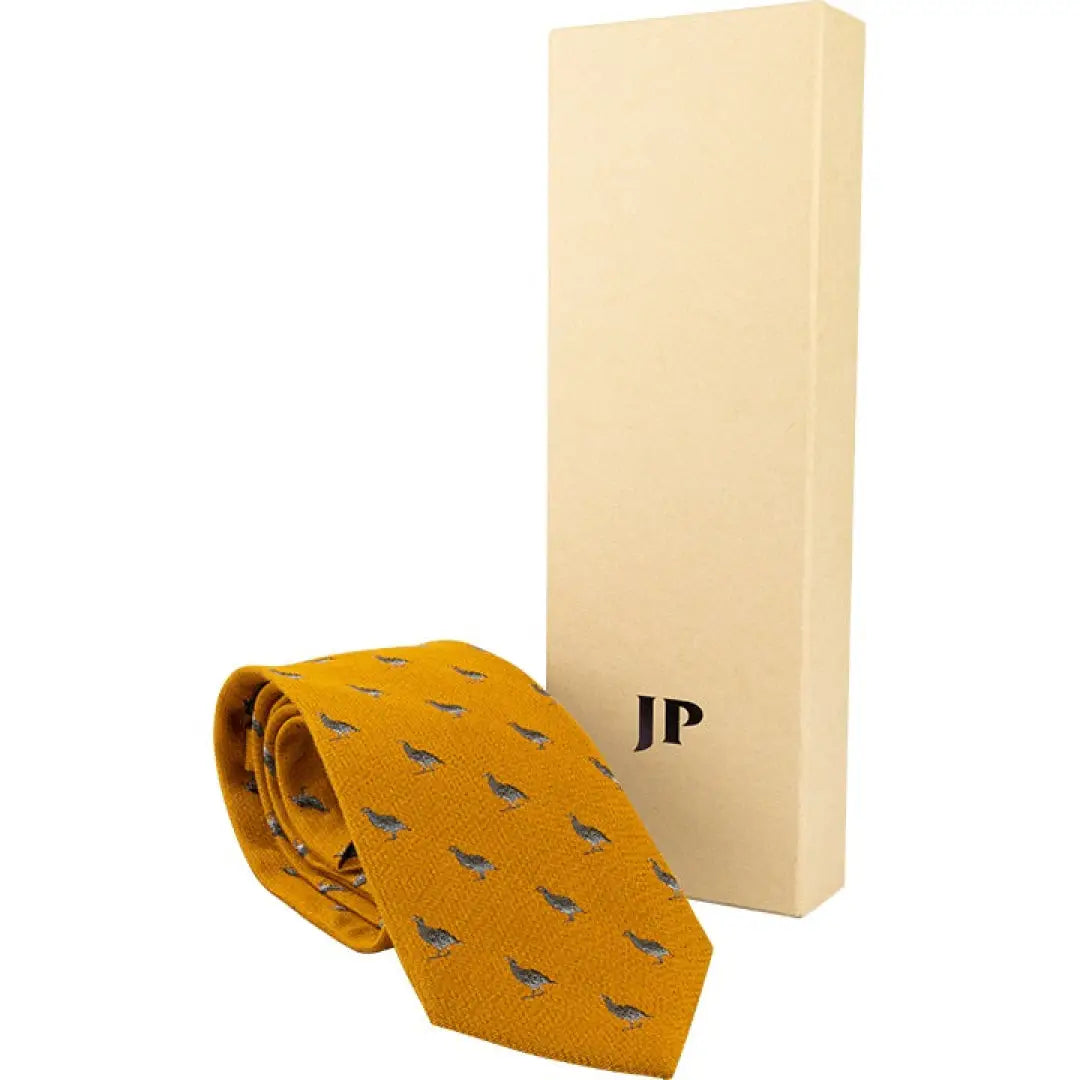 Jack Pyke Partridge Silk Tie with yellow necktie and blue bird pattern beside box