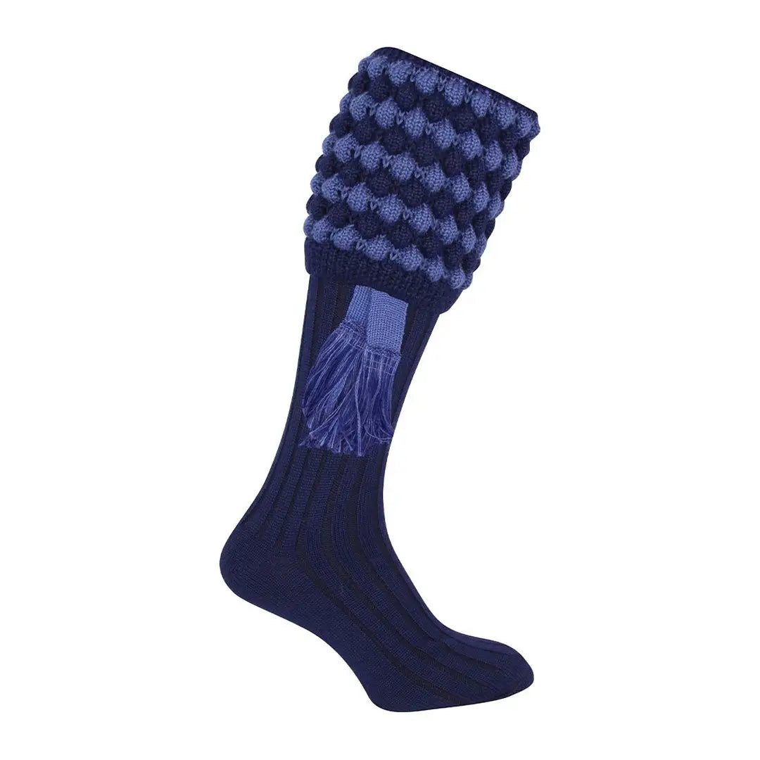 Navy and light blue patterned Jack Pyke Pebble Shooting Socks with fun tassels