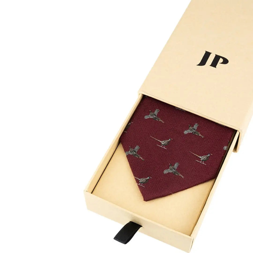 Burgundy Jack Pyke silk tie with textured woven design of small pheasants