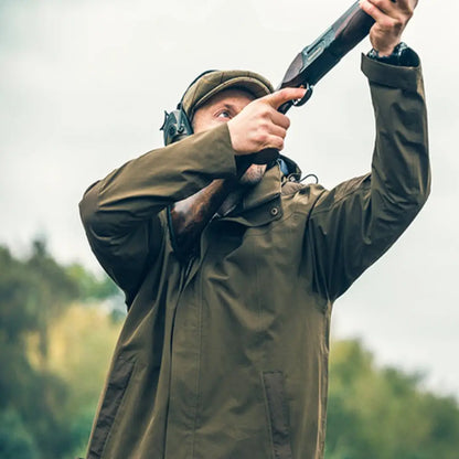 Person in Jack Pyke Pro-Lite Hunters Jacket aiming a shotgun upwards