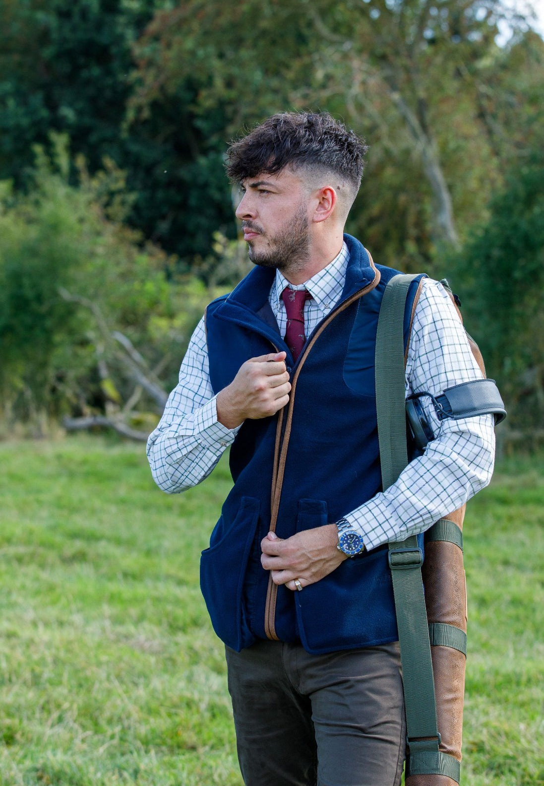 Man in outdoor attire wearing a Jack Pyke Shooters Gilet for versatile comfort