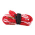 Jack Pyke Snaky shotgun bore cleaner tool with red, white, and black woven cord