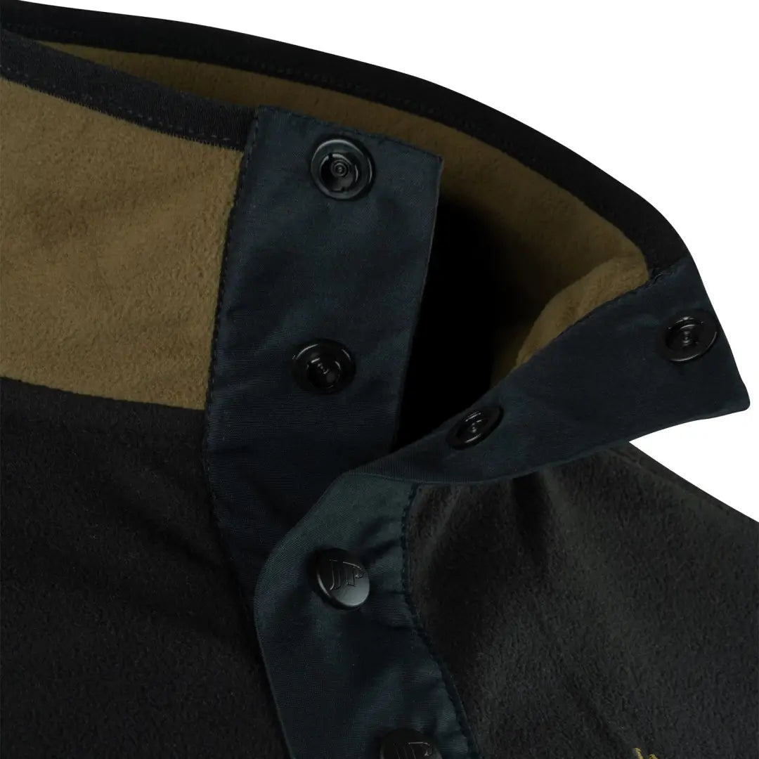 Collar detail of Jack Pyke Snap Neck Fleece Top with buttons and fabric texture