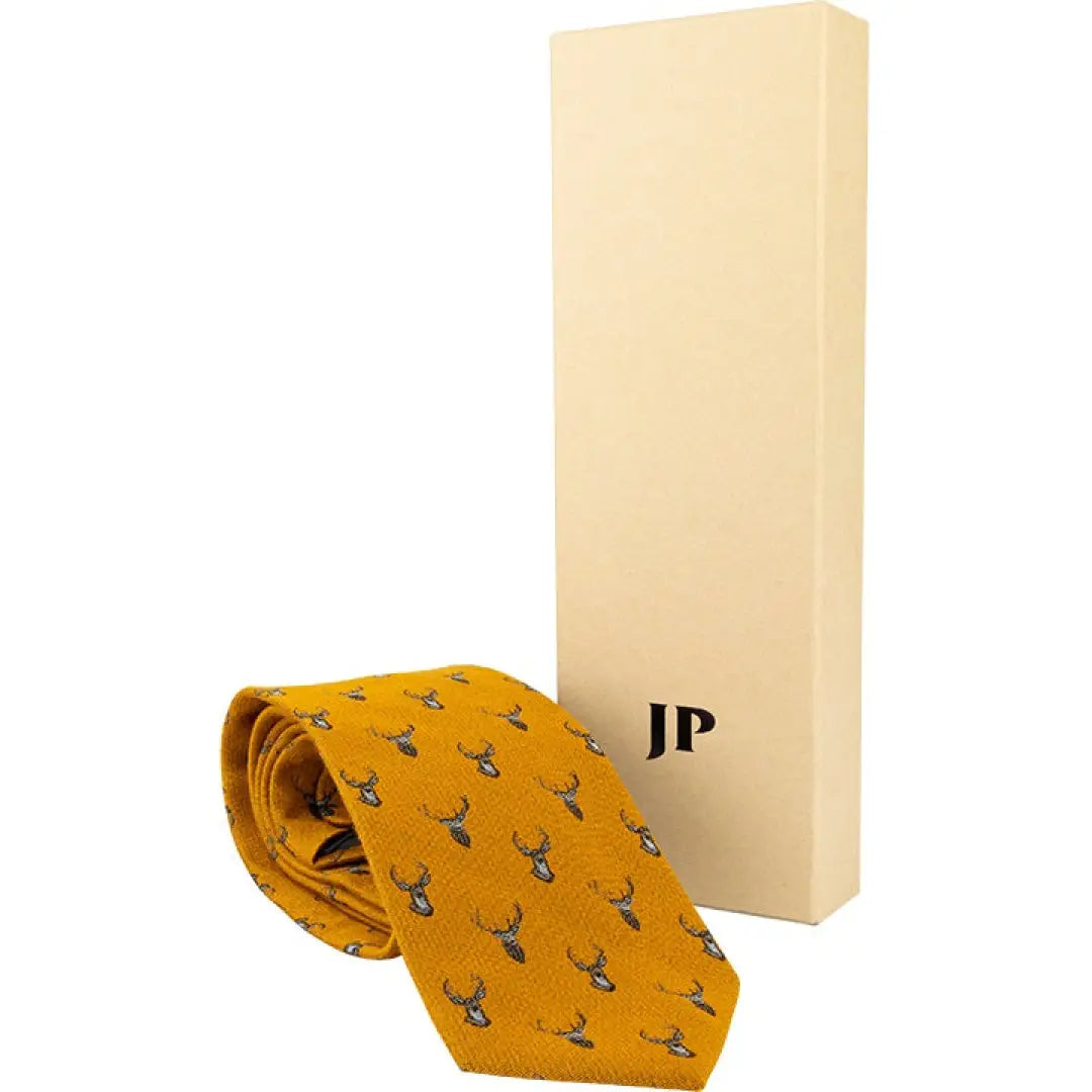 Stylish Jack Pyke Stag Silk Tie in yellow with deer pattern beside a gift box