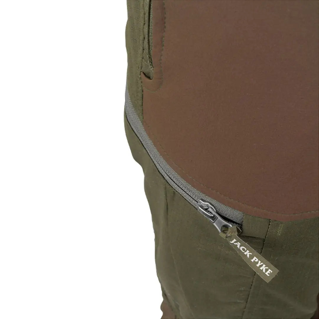 Zipper pocket on Jack Pyke Technical Hybrid Trousers in olive green color