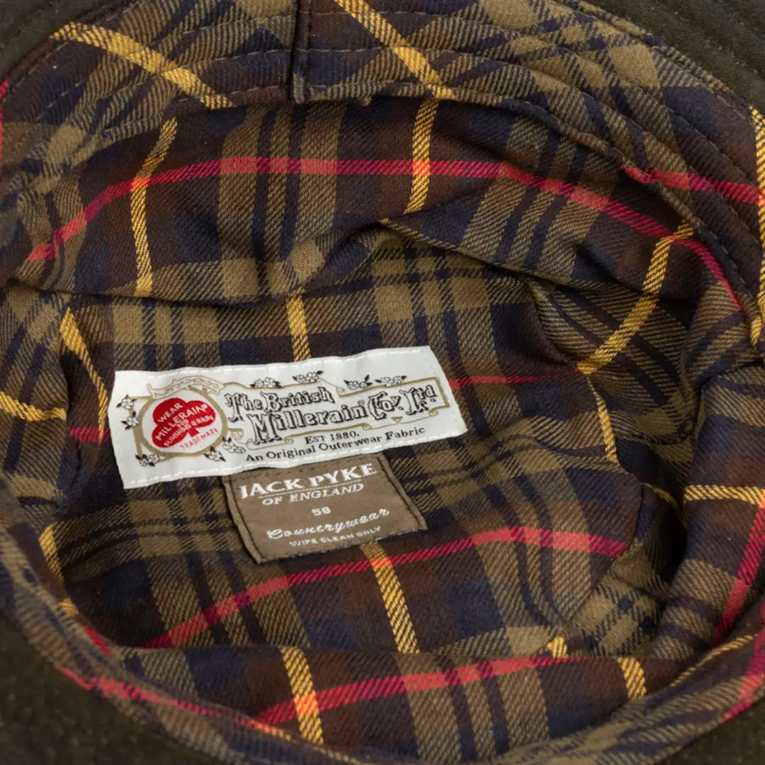 Plaid fabric with Tailored Sportsman and Jack Wills tags on Jack Pyke Wax Bucket Hat