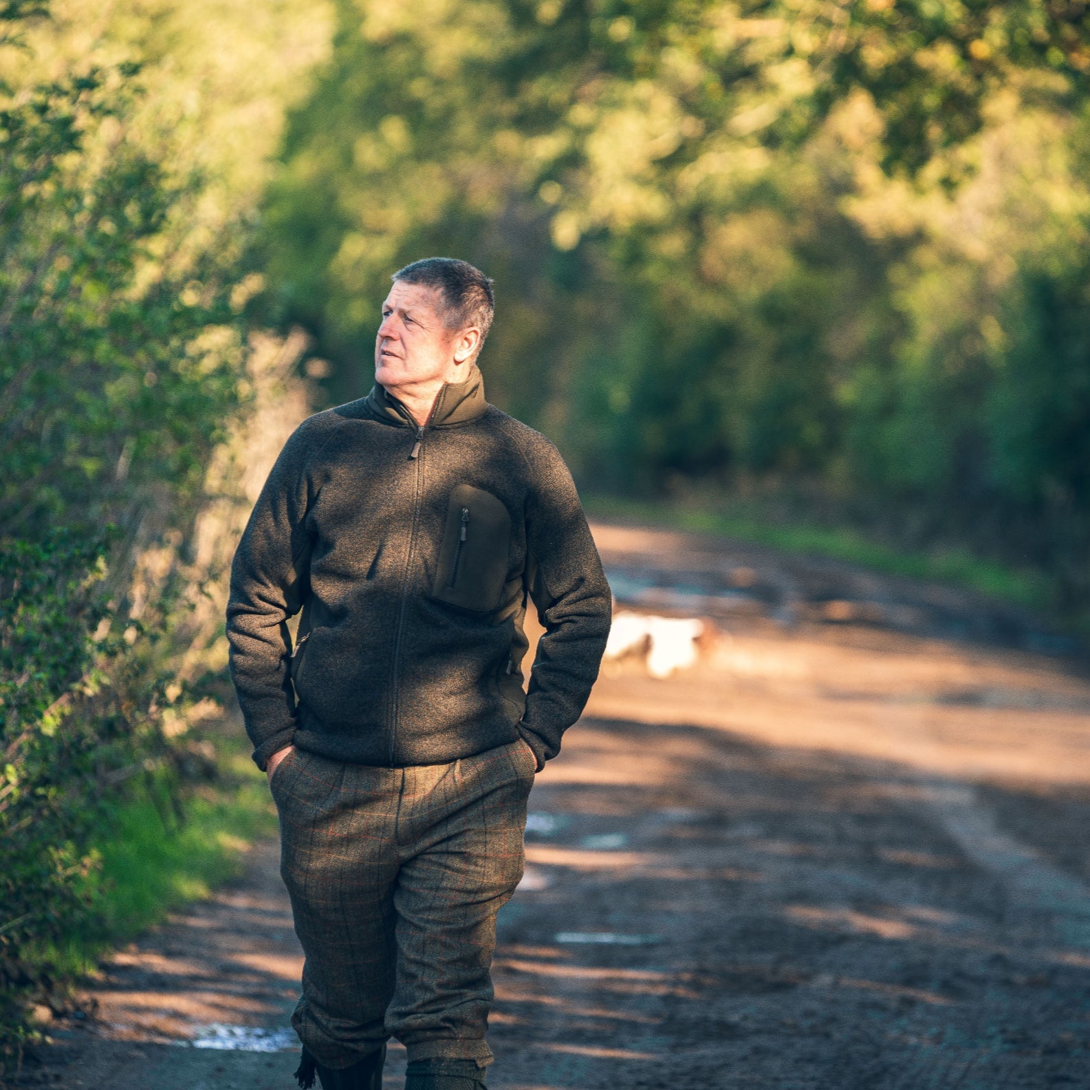 Man in outdoor clothing wearing a Jack Pyke Weardale Knitted Jacket for adventure