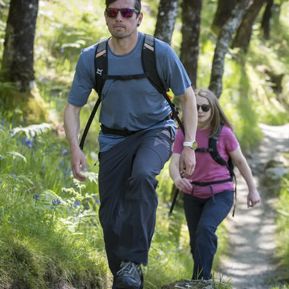 Hikers enjoying a forest trail in their Keela Trail Short Sleeve Top, perfect wicking base layer