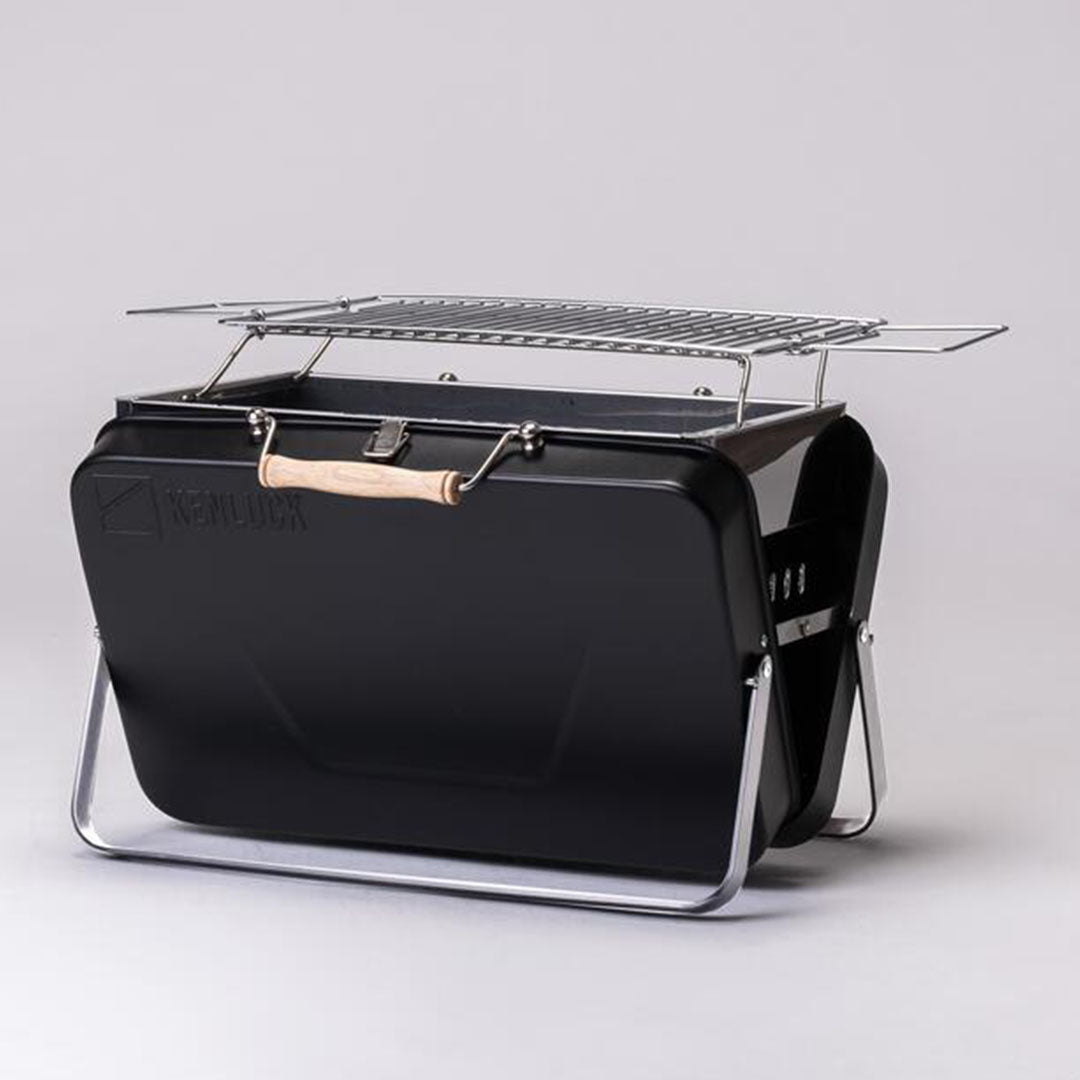 Portable black charcoal grill from Kenluck Party Grill for your outdoor BBQ fun