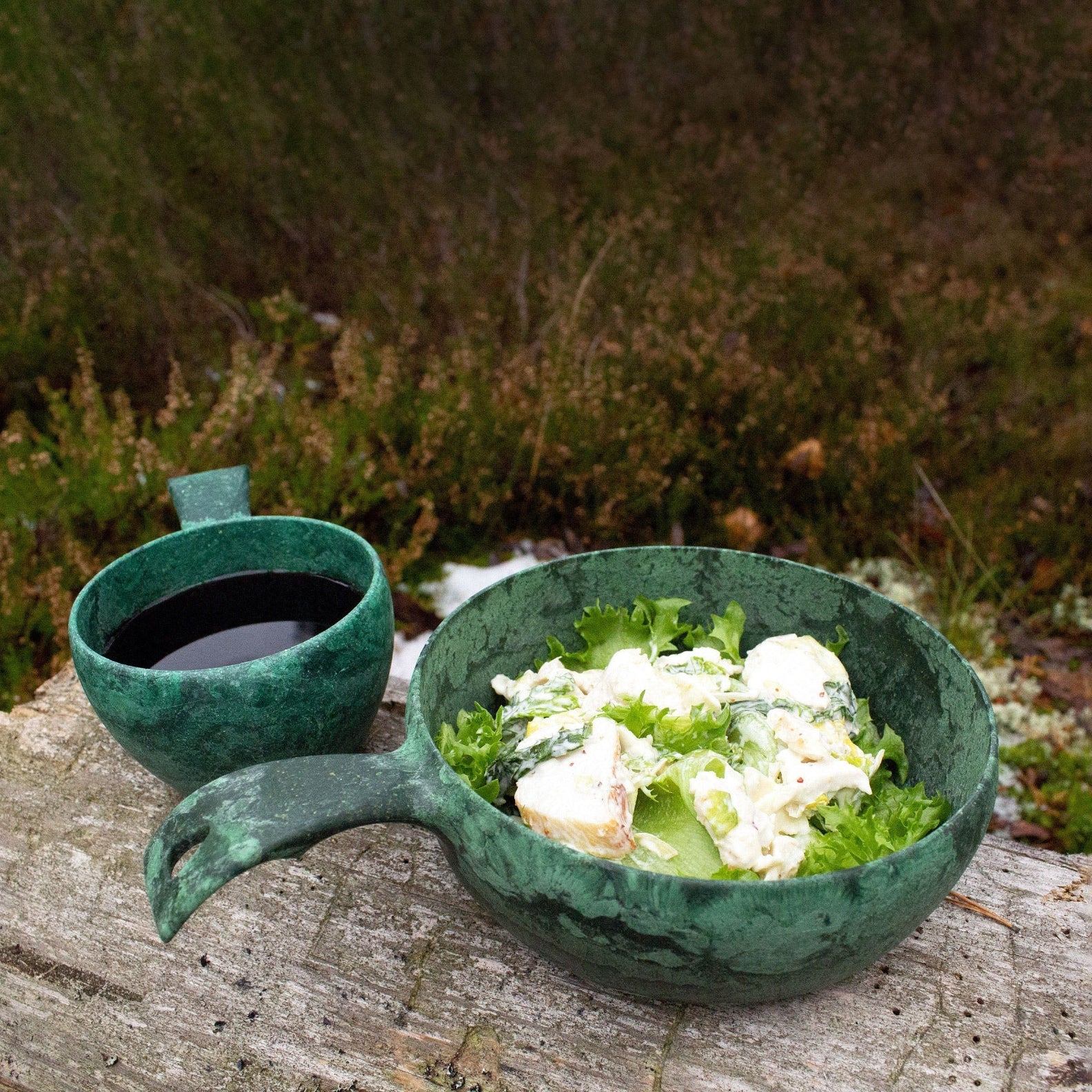 Green wooden bowl and cup from Kupilka, perfect for country clothing and outdoor adventures