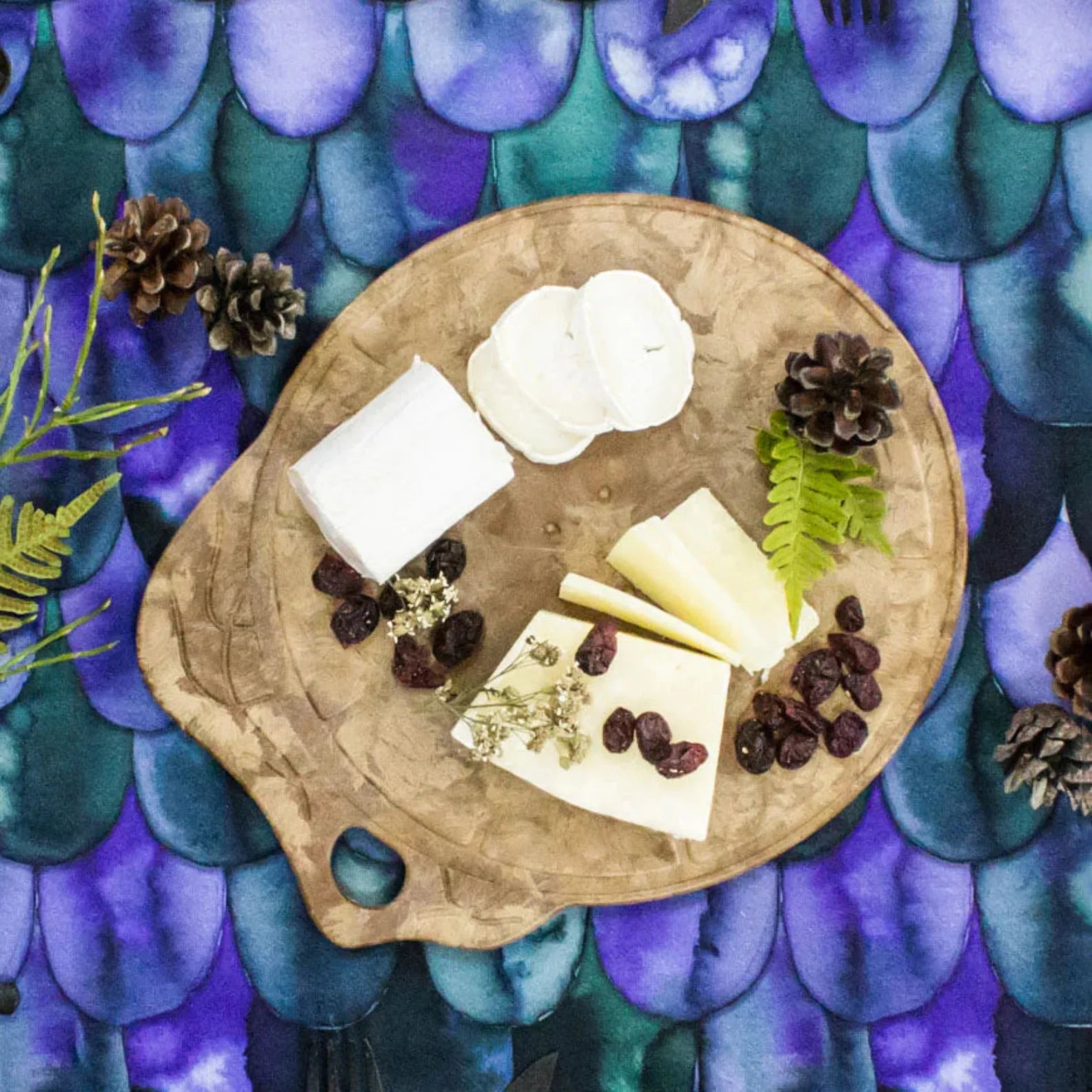 Cheese board with assorted cheeses on Kupilka Kaarna Medium Service Tray for stylish serving