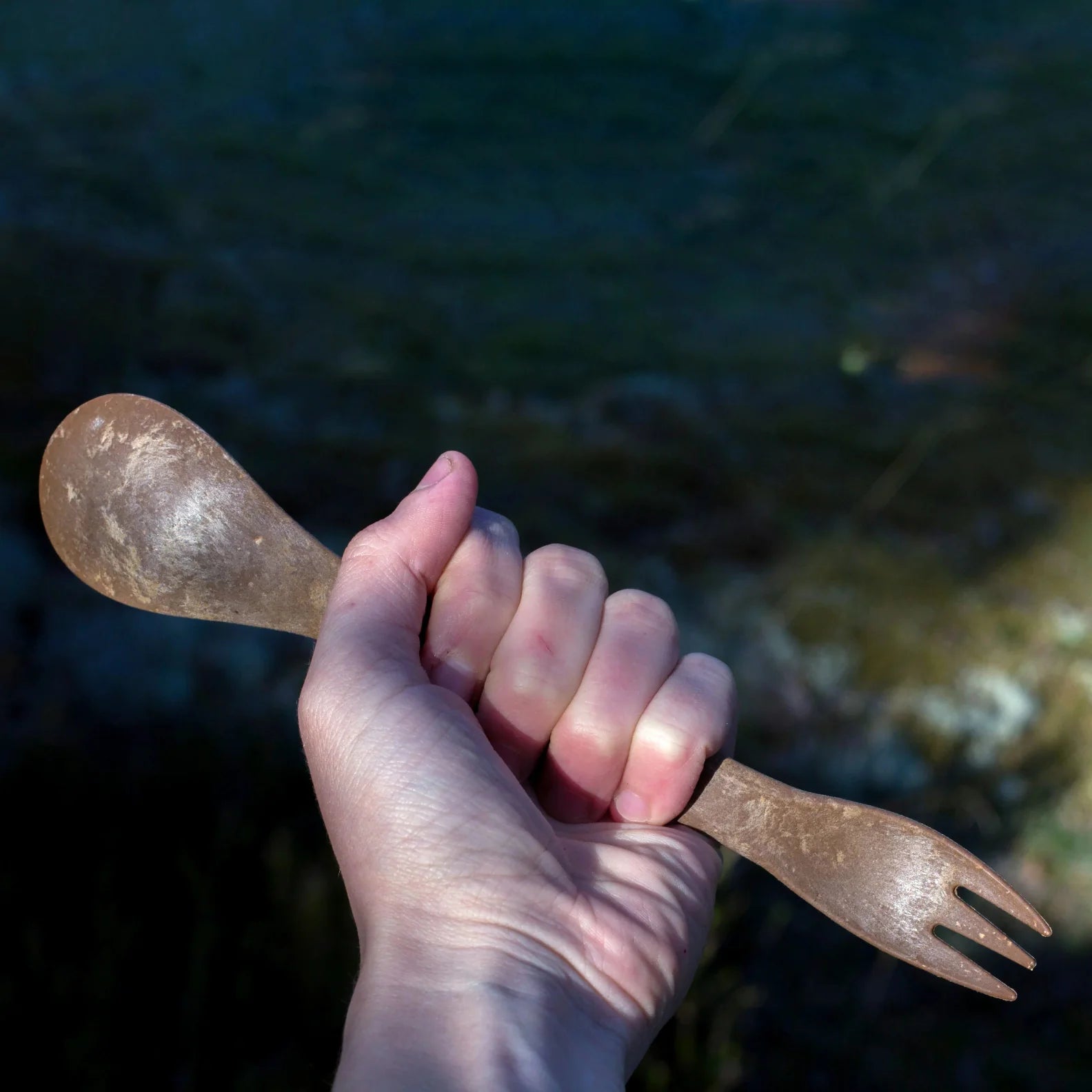 Brown plastic spork from Kupilka, perfect for country clothing and outdoor adventures