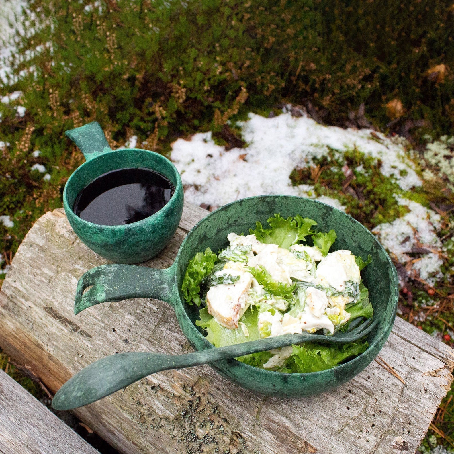 Green outdoor dining set perfect for country clothing lovers enjoying hunting trips