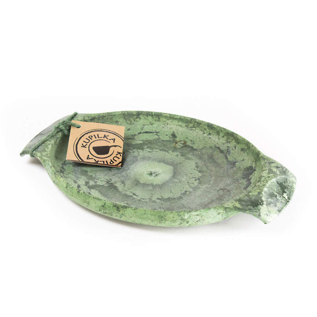 Green oval Kupilka Plate with handle and tag, perfect for outdoor dining and country clothing