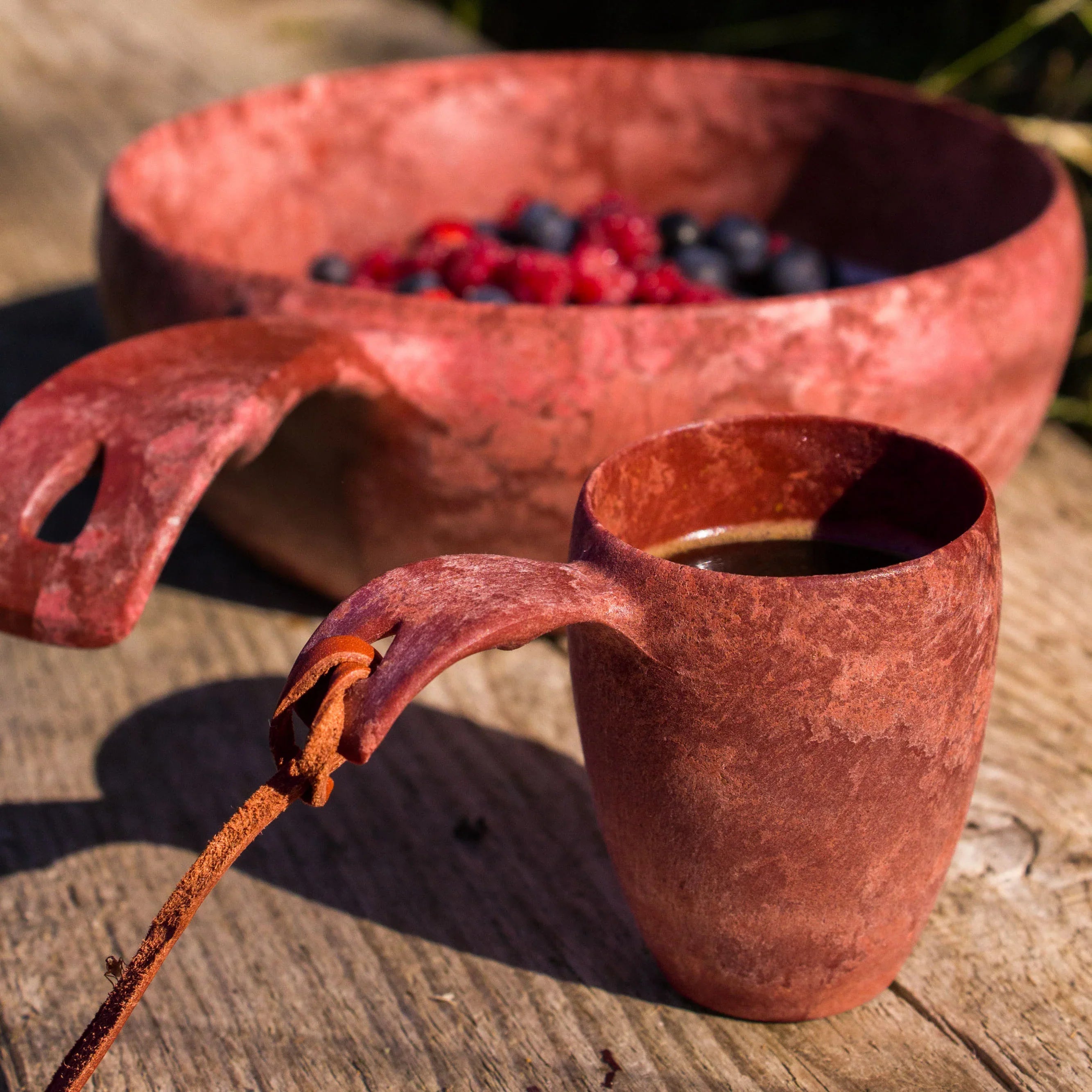 Reddish-brown wooden Kupilka Shot Cup perfect for country clothing and hunting vibes