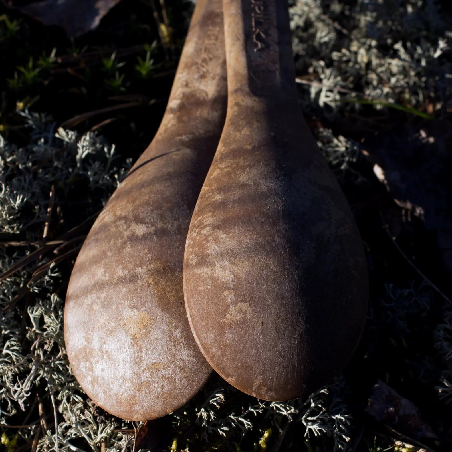 Weathered brown shoe stretchers for country clothing and outdoor adventures with Kupilka Spork