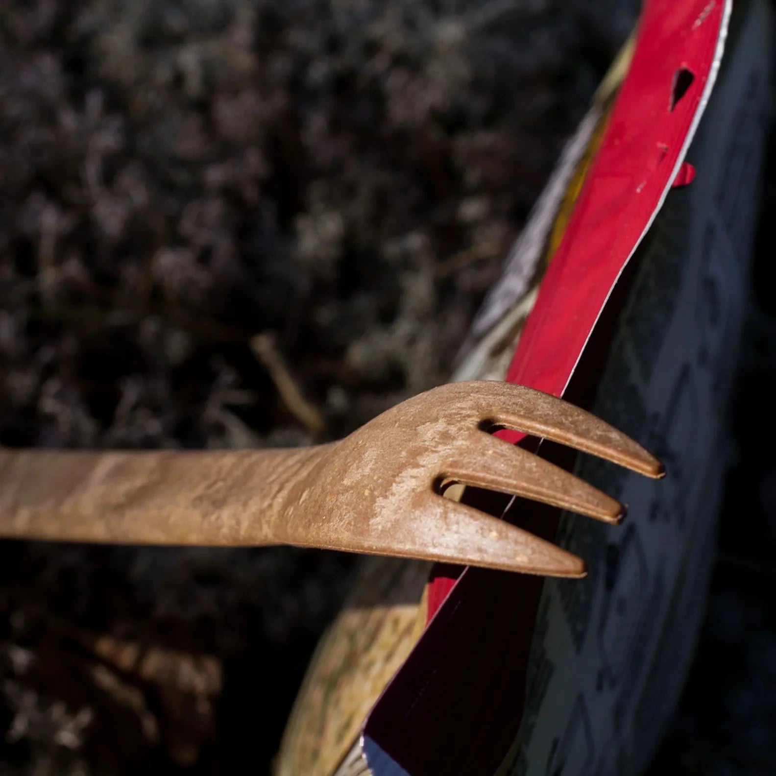 Rustic wooden fork from Kupilka Spork, perfect for country clothing and outdoor hunting trips