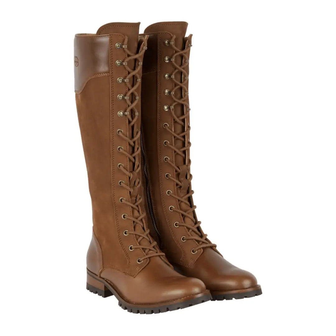 Tall brown leather lace-up boots with rugged soles for a fully waterproof experience