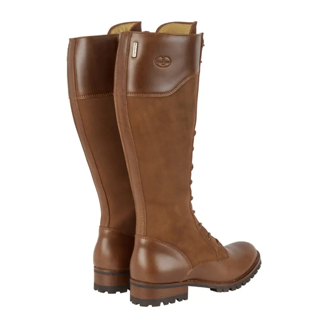 Tall brown leather Le Chameau La Parisienne Boots with laces, offering a fully waterproof experience