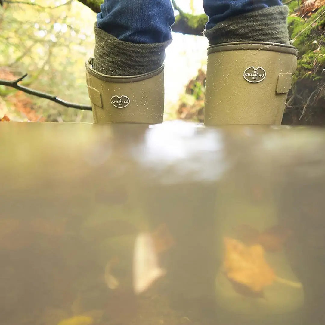 Beige Le Chameau Men’s Chasseur Neoprene Lined Boots in shallow water