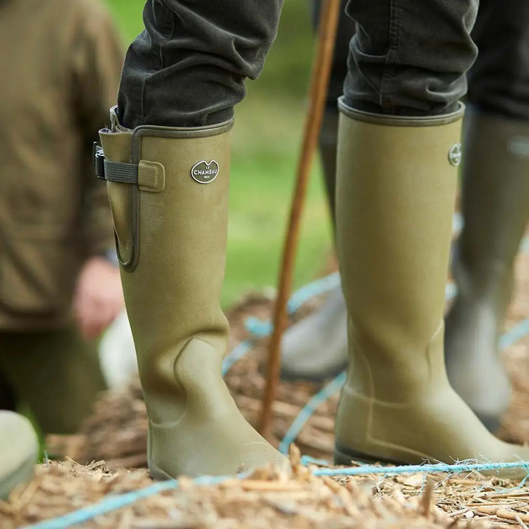 Olive-green Le Chameau Women’s Vierzon Jersey Lined Wellington Boots on straw