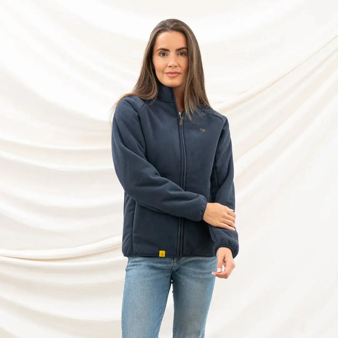 Woman in navy blue zip-up fleece jacket made of anti-pill brushed fleece