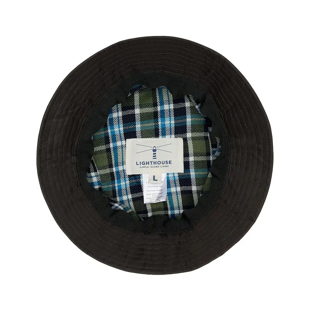 Black bucket hat with plaid lining perfect for the Lighthouse York Rain Hat