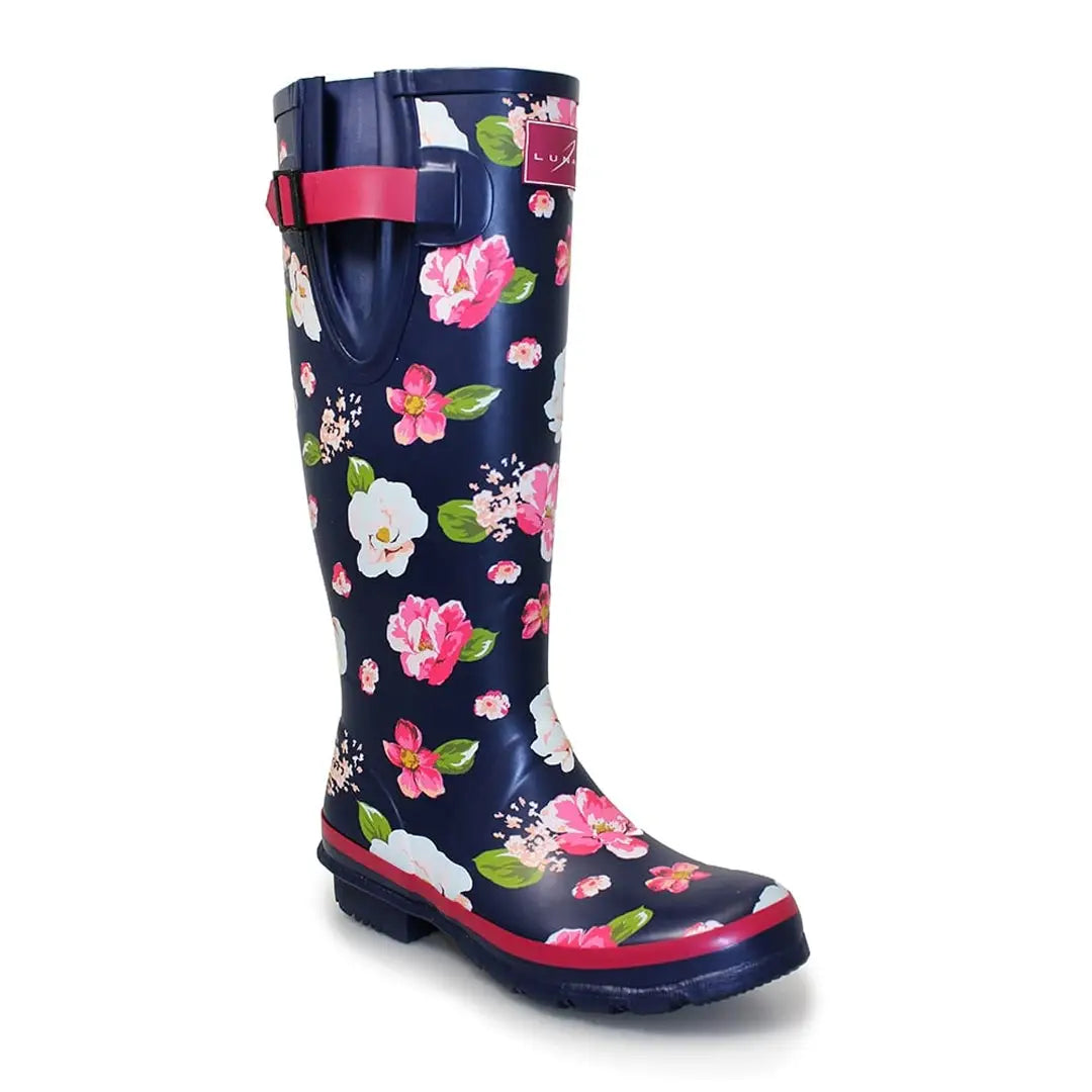 Floral-patterned navy blue Lunar Garden Wellingtons with a stylish pink strap