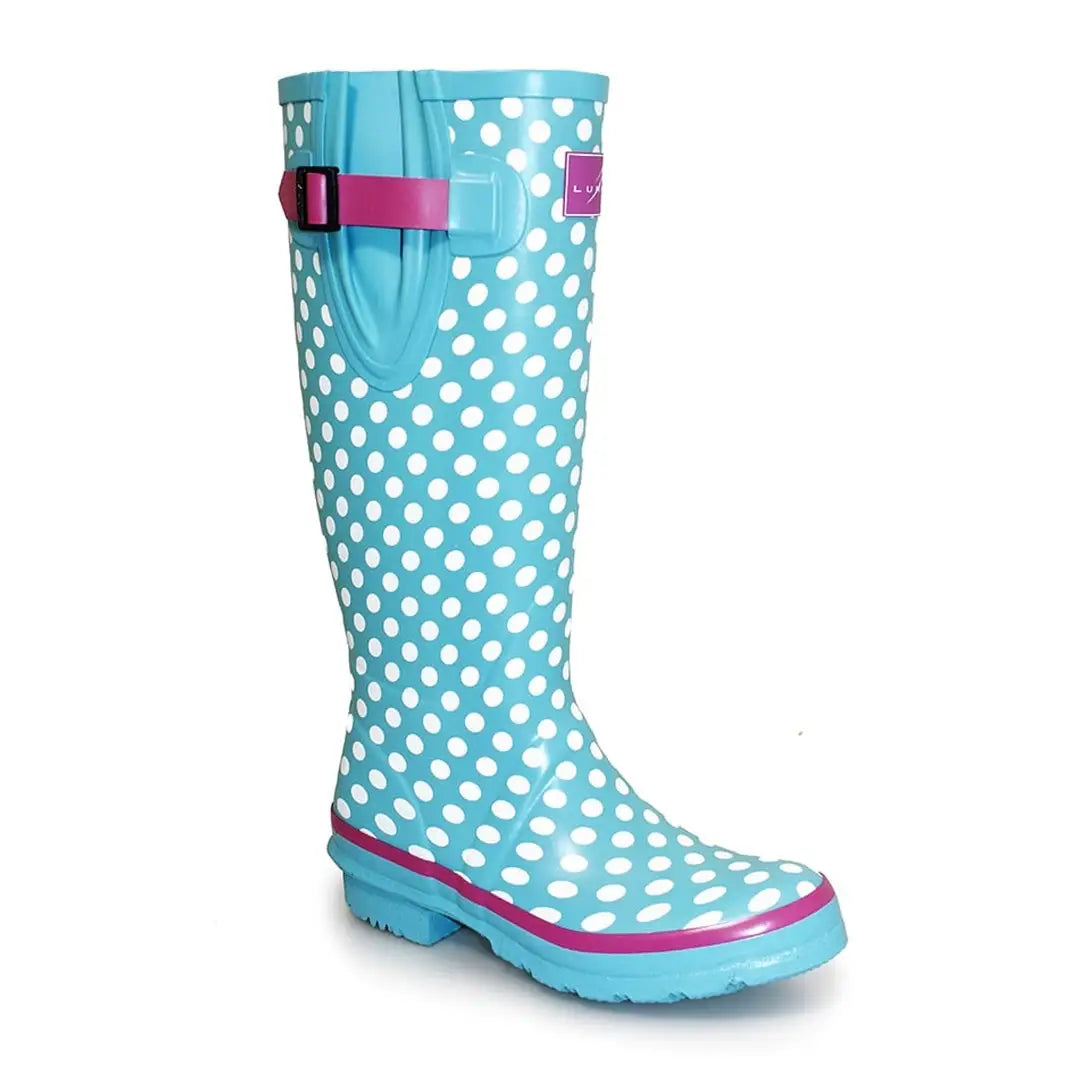 Turquoise polka dot rain boot with pink trim, perfect for Lunar Polka Dot Wellington fans